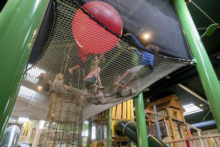 Children play in the indoor playground "Skik" at the Witterzomer holiday park