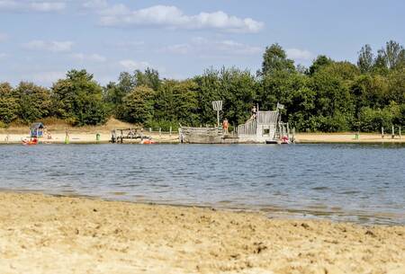 Playground equipment near the lake at holiday park Witterzomer