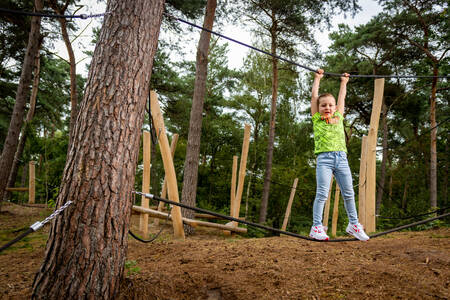 Girl on a climbing course at Krieghuusbelten holiday park