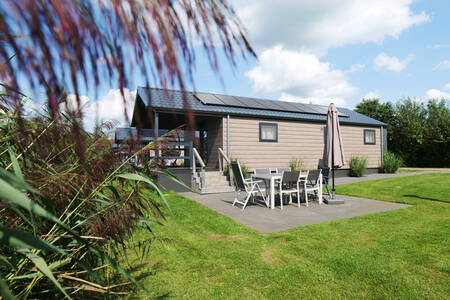 A water villa with solar panels at Krieghuusbelten holiday park