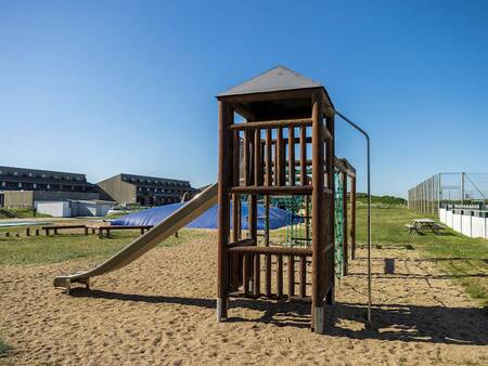 Playground with climbing frame and air trampoline at Landal Strandappartementen Fyrklit