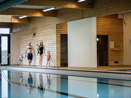 Family in the indoor pool of holiday park Landal Beach Park Ebeltoft