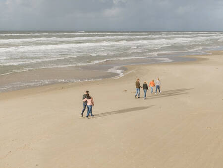 People walking on the beach at holiday park Landal Beach Park Grønhøj Strand