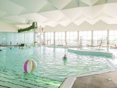 Swimming pool with slide of holiday park Landal Beach Resort Ooghduyne