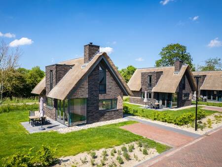 Luxury holiday villas with thatched roofs at the Landal Berger Duinen holiday park