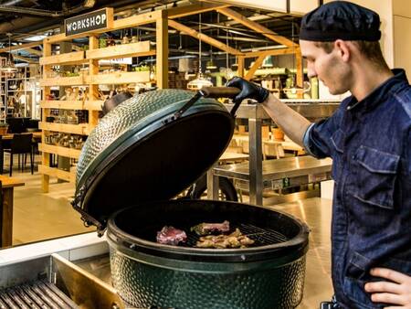 A cook barbecues in a restaurant at the Landal Coldenhove holiday park