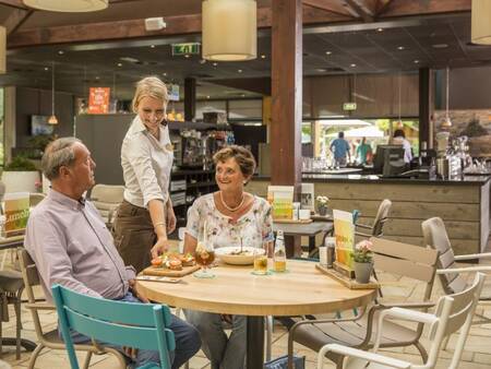 Terrace of catering at Landal De Lommerbergen holiday park