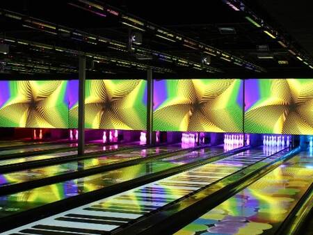 Bowling at the "glow in the dark" bowling alley of holiday park Landal De Lommerbergen