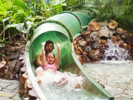 Slide in the Subtropical swimming paradise at Landal De Lommerbergen holiday park