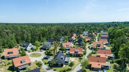 Aerial view of holiday homes and forest of holiday park Landal De Vers