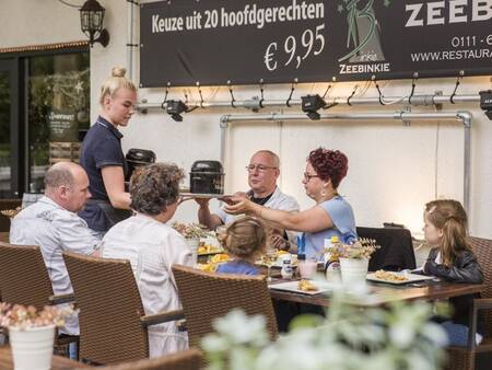 Dining in restaurant Zeebinkie at holiday park Landal Duinpark 't Hof van Haamstede