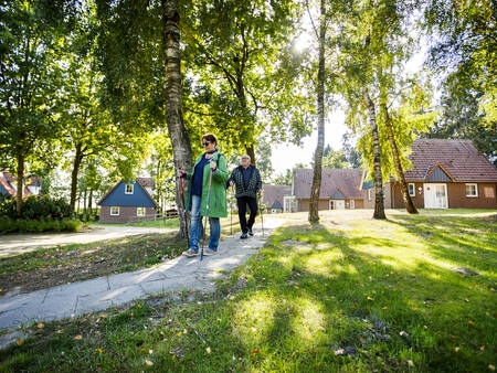 Walking between the holiday homes at the Landal Dwergter Sand holiday park