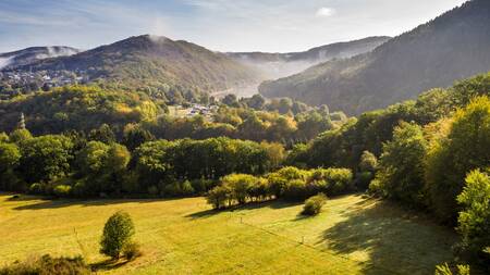 The beautiful hilly landscape with forests around the Landal Eifel Prümtal . holiday park