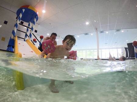 Slide in the paddling pool of the swimming pool at the Landal Landgoed Aerwinkel holiday park