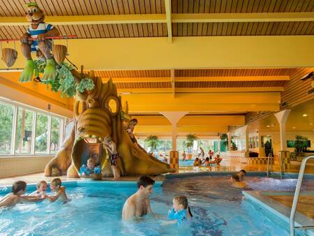 Swimming together in the indoor pool of holiday park Landal Heideheuvel