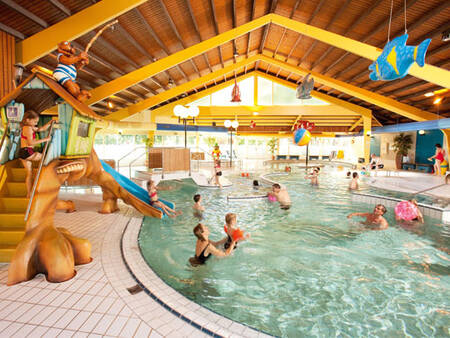 The indoor pool with slide at Landal Heihaas holiday park