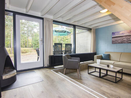 Living room of a holiday home at Landal Het Vennenbos