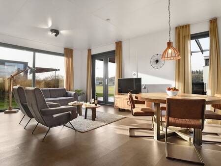 Spacious living room of a holiday home at Landal Holiday Park Sallandse Heuvelrug
