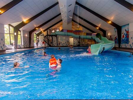 Indoor pool with long slide at Landal Holiday Park Sallandse Heuvelrug