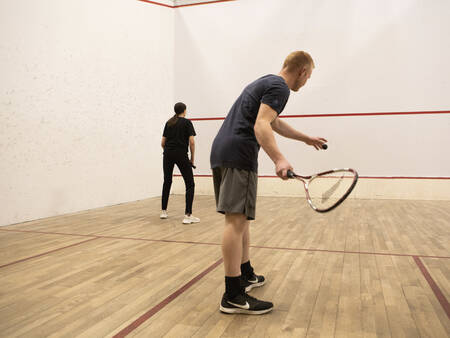 playing squash on the squash court of Landal Holiday park Rønbjerg