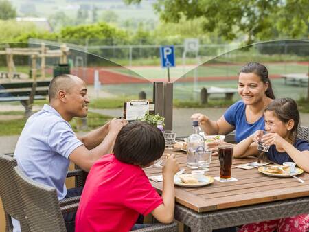 Enjoy a snack on the terrace of the Brasserie at the Landal Hoog Vaals holiday park
