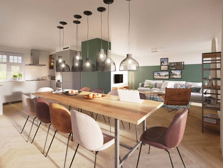 Dining table and kitchen of a holiday home at Landal Kaatsheuvel holiday park