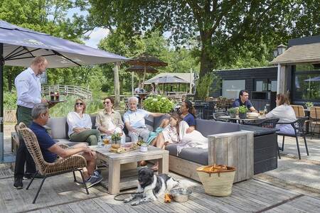 People on the terrace of restaurant De 3 Vennen at the Landal Klein Oisterwijk holiday park