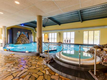 The indoor swimming pool with whirlpool at the Landal Marina Resort Well holiday park