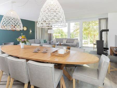 Table in a living room of a holiday home at the Landal Mont Royal holiday park