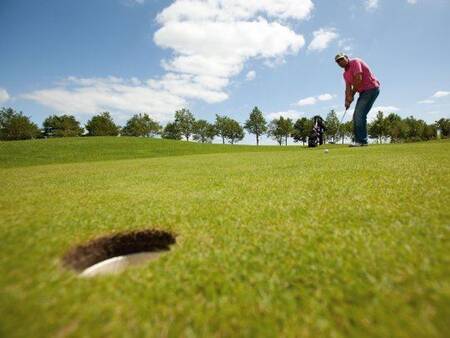 There is a golf course next to Landal Residence 't Hof van Haamstede