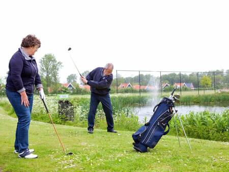 Golfing at Golfboerderij Molenberg next to Landal Residence 't Hof van Haamstede