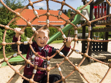 Child in a playground at the Landal Salztal Paradies holiday park