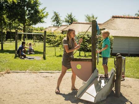 Small slide in a playground at Landal Schuttersbos holiday park