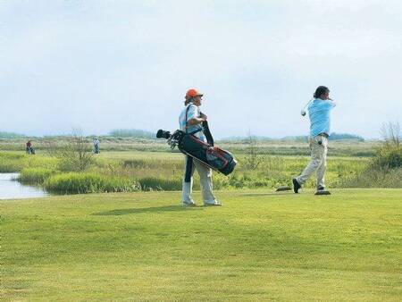 Golfing on the Texelse golf course near the Landal Sluftervallei holiday park