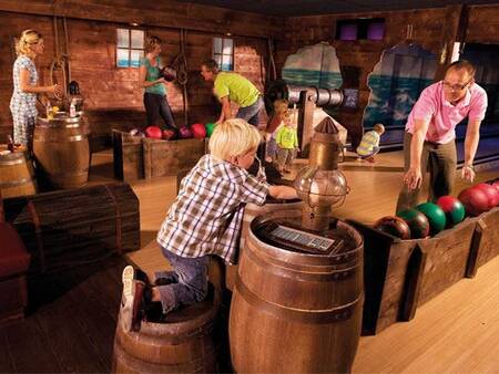 A game of bowling at the bowling alley of the Landal Sluftervallei holiday park