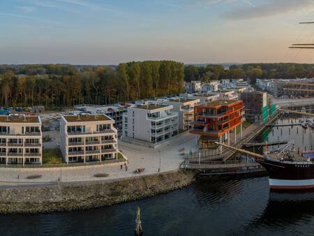 Aerial view of the harbor with apartments - Landal Travemünde