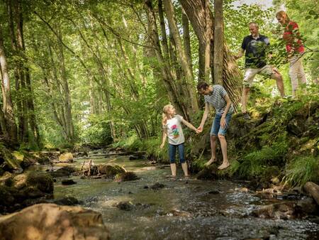Family by a river in the Ardennes - Landal Village les Gottales