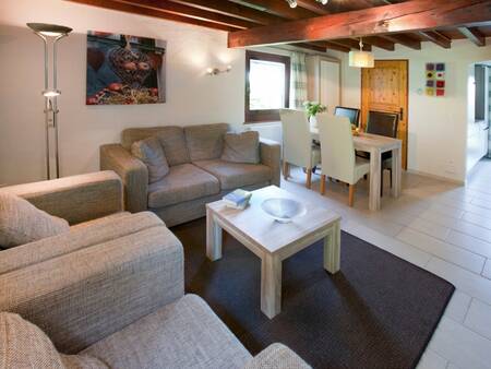 Living room of a holiday home at the Landal Village les Gottales holiday park