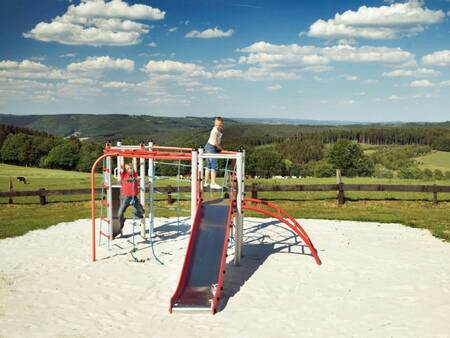 Children climb in the playground of the Landal Village les Gottales holiday park