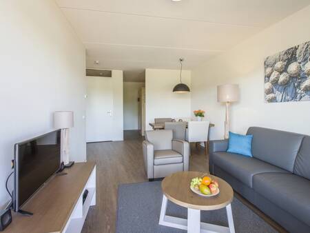 Living room of an apartment at Landal Vlieduyn