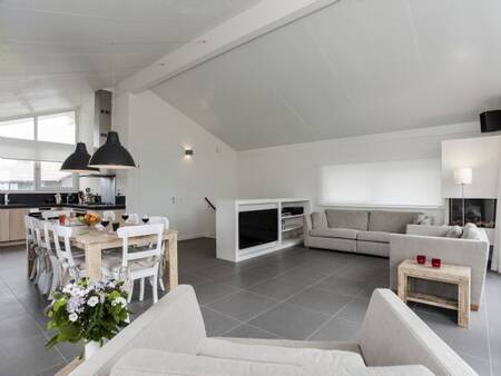 Living room of a chalet at the Landal Waterpark Sneekermeer holiday park