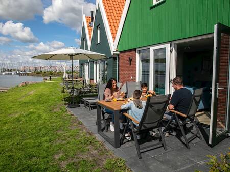 Garden of a holiday home on the Markermeer at the Landal Waterpark Volendam holiday park