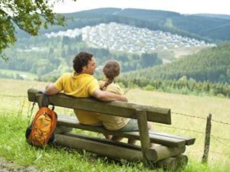 Landal Winterberg - A couple on a bench enjoying the view