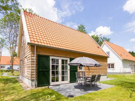 Garden with terrace of a holiday villa at the Landal de Waufsberg holiday park