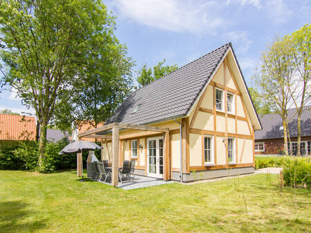 Garden with terrace of a "half-timbered house" at the Landal de Waufsberg holiday park