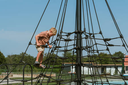Little boy playing in the playground of MarinaPark Residentie Bloemendaal