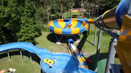 Various slides in the water play park "Splesj" at holiday park Molecaten Bosbad Hoeven