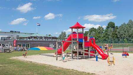 Large playground with air trampoline at holiday park Molecaten Park Flevostrand