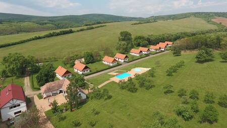 aerial view of the small-scale holiday park Molecaten Park Legénd Estate and the outdoor pool