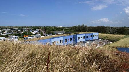 Dune houses in the dunes at holiday park Molecaten Park Noordduinen